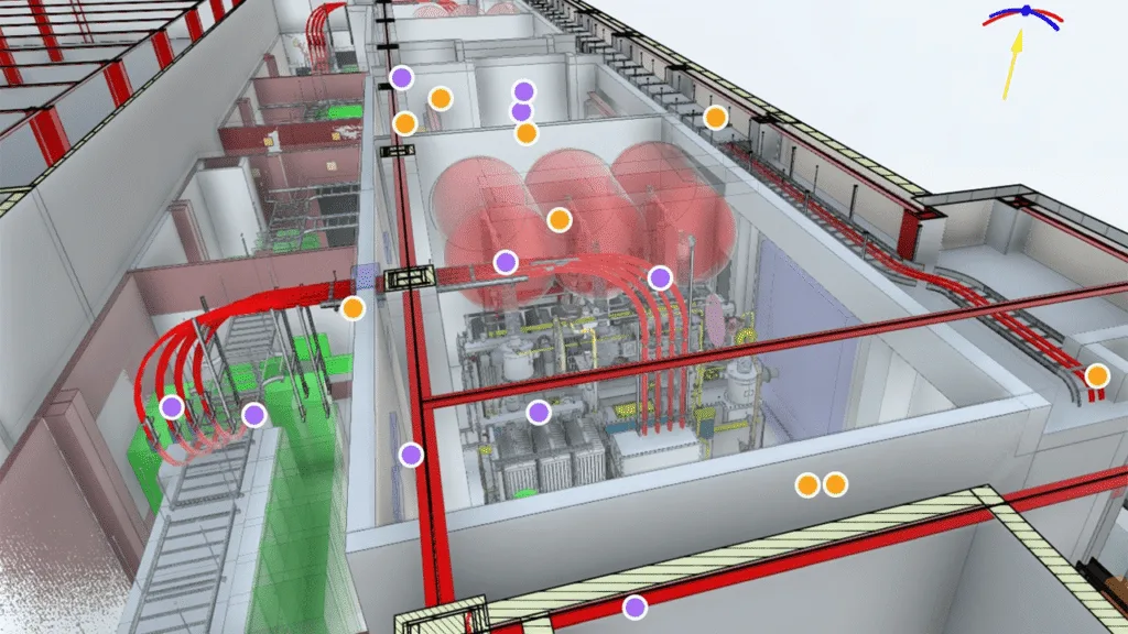 3D building model of an industrial facility designed for engineering or surveying purposes, showing machinery, red and green pipework, and coloured markers indicating specific points or sections.