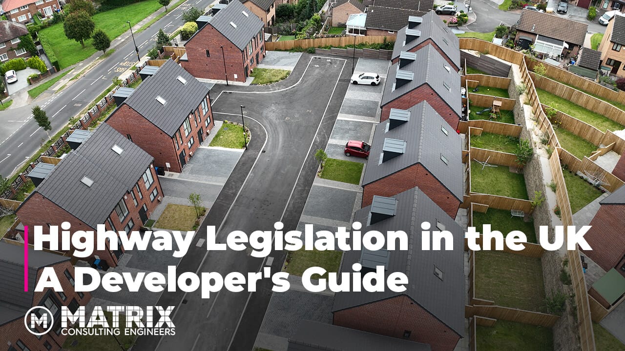 Aerial view of a modern UK housing development with new roads, green spaces, and parked cars; overlaid text reads “Highway Legislation in the UK: A Developers’ Guide.